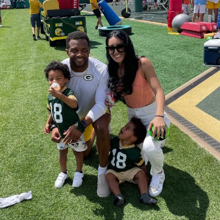 Aiyda Ghahramani and Randall Cobb with their kids.  